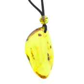 Beautiful pierced Baltic amber pendant with cord