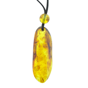 Beautiful pierced Baltic amber pendant with cord