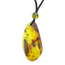 Beautiful pierced Baltic amber pendant with cord