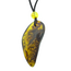 Beautiful pierced Baltic amber pendant with cord