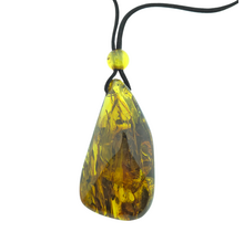Beautiful pierced Baltic amber pendant with cord