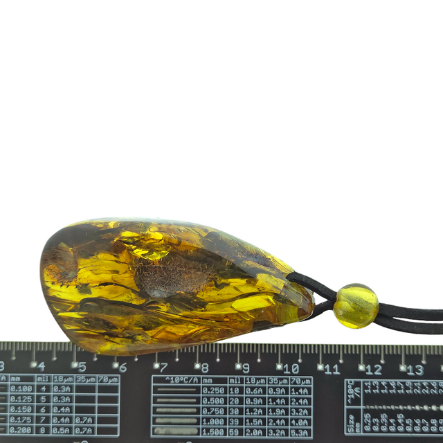 Beautiful pierced Baltic amber pendant with cord