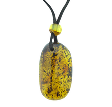 Beautiful pierced Baltic amber pendant with cord