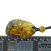 Beautiful pierced Baltic amber pendant with cord