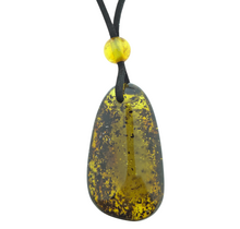 Beautiful pierced Baltic amber pendant with cord