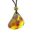 Beautiful pierced Baltic amber pendant with cord