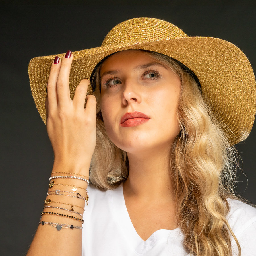 My Bendel Elegant gouden tennisarmband met sprankelende witte zirkonia. Verstelbare sluiting voor perfect comfort. Blijft mooi en irriteert niet. # PO2301