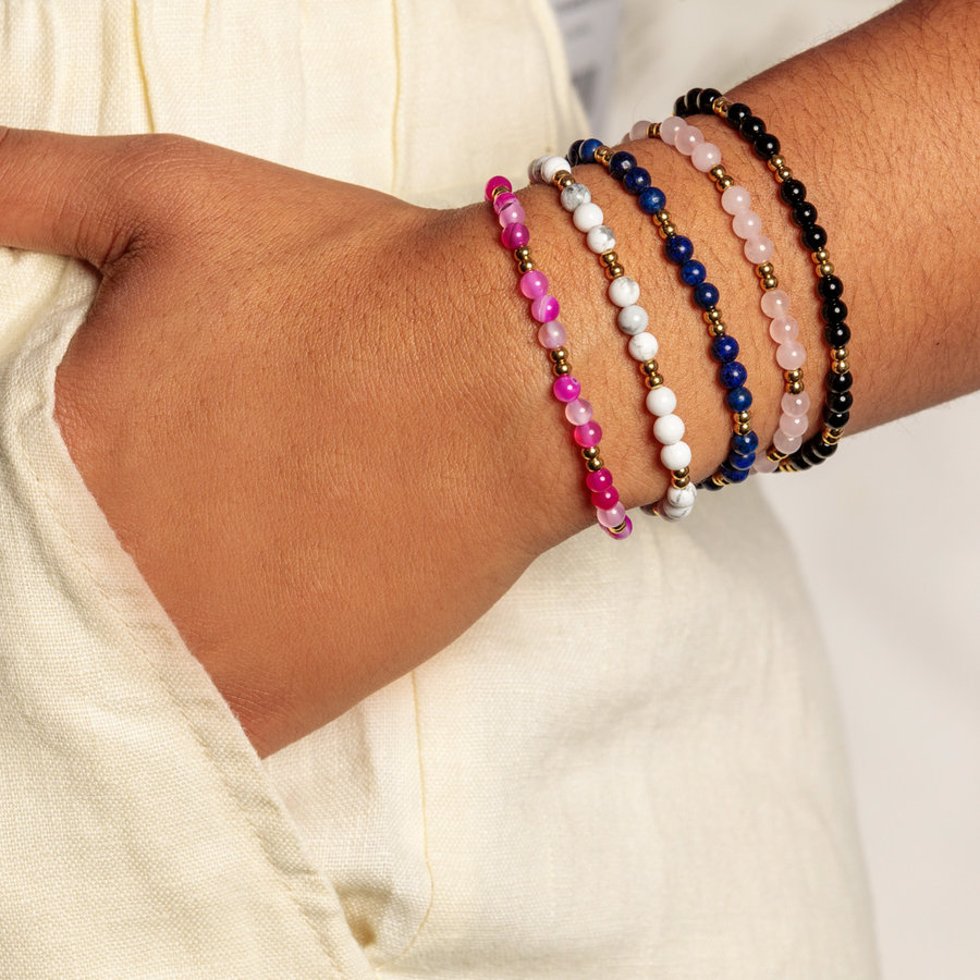 My Bendel Goldenes elastisches Armband aus Edelstahl kombiniert mit Onyx-Edelstein