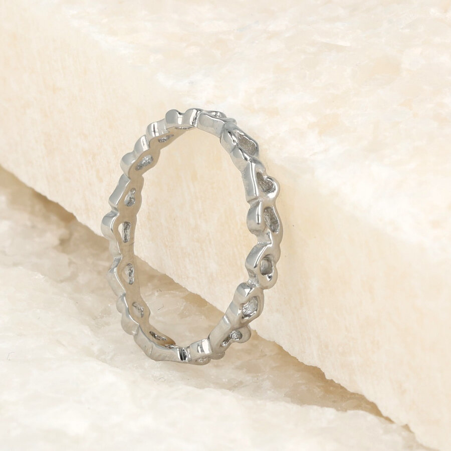 My Bendel Zilveren ring met open hartjes patroon