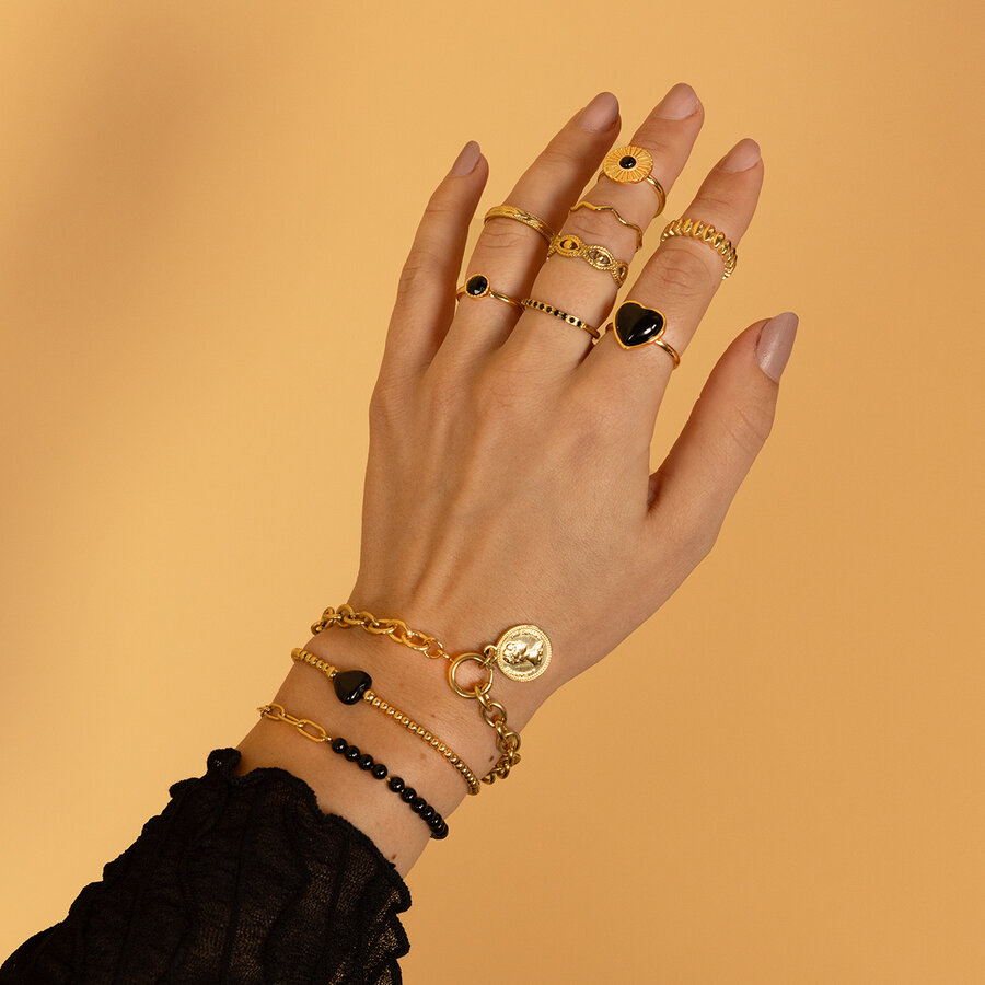 My Bendel  Goldring mit schwarzem Glasstein und gedrehter Kante
