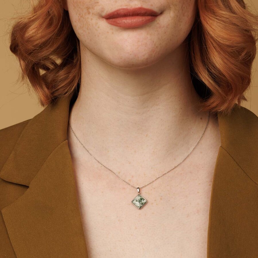 My Bendel Unique combination of a silver-tone link chain with a diamond Green Spot Jade pendant