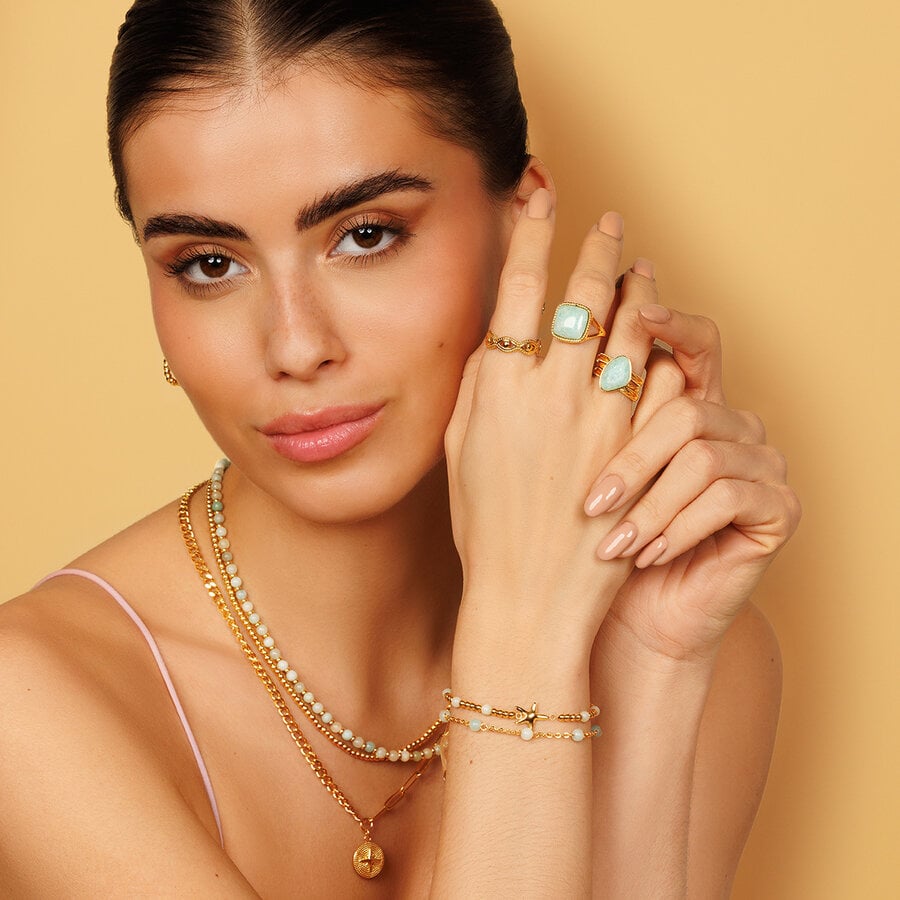 My Bendel Unieke gouden ring met Amazonite edelsteen, elegant en creatief design. Eyecatcher voor sieradenliefhebbers. 1 jaar garantie.