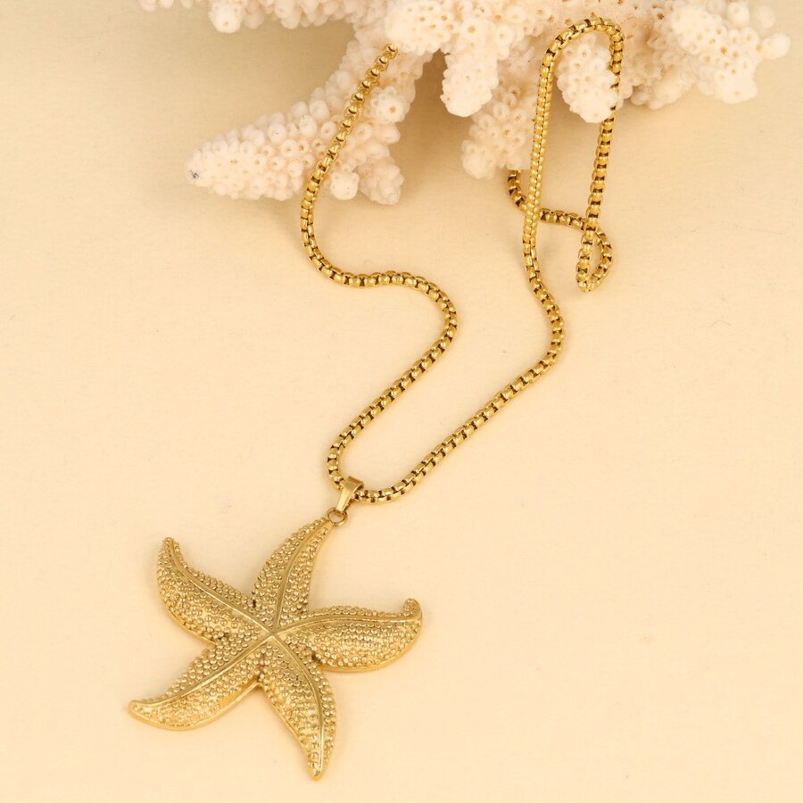 My Bendel Long gold necklace with starfish charm