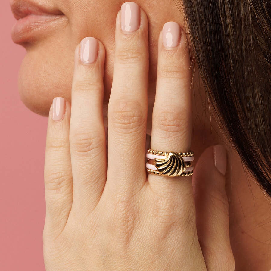 My Bendel Pink narrow ceramic rings, gold ball extension rings and ring with shell
