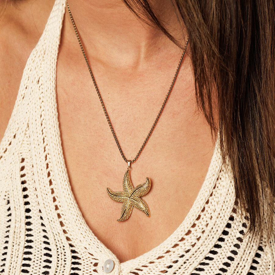 My Bendel Long gold necklace with starfish charm