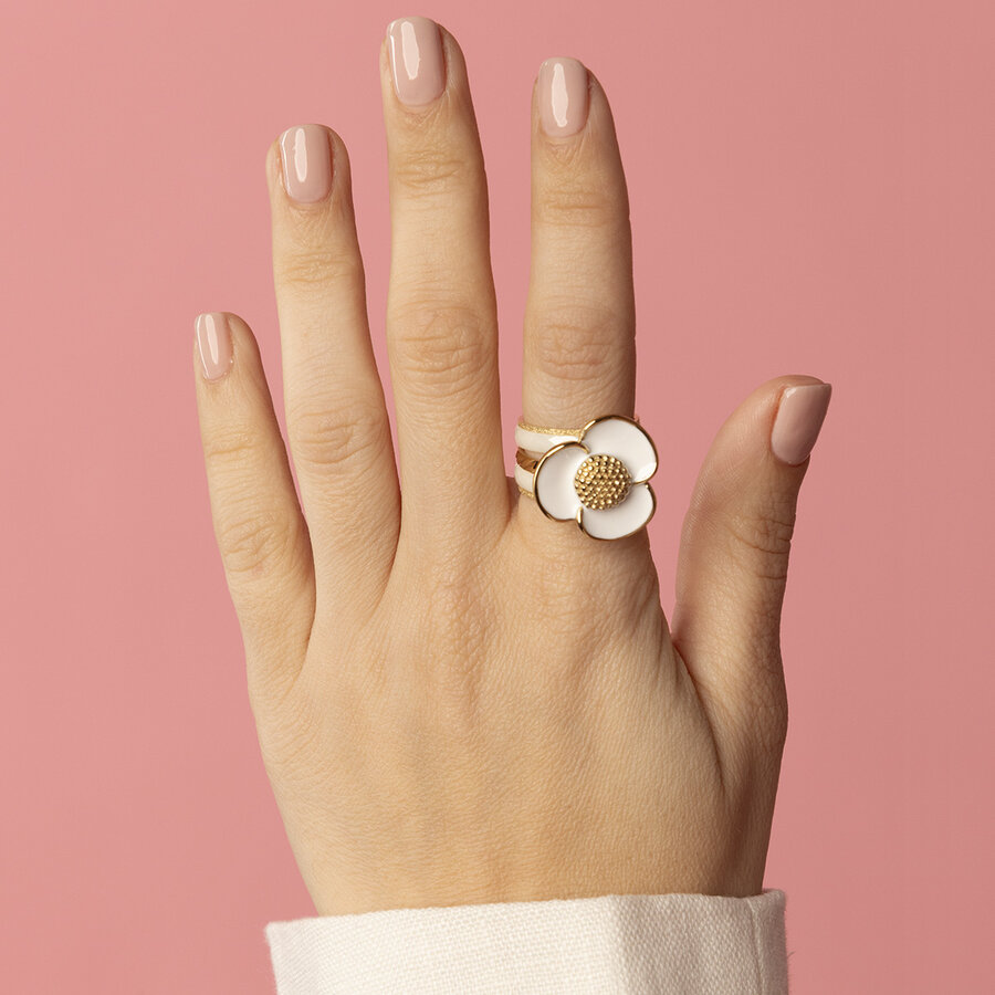 My Bendel Witte keramiek en gouden stardust ringenset met epoxy bloem. Luxe en stijlvol. Inclusief 1 jaar garantie.