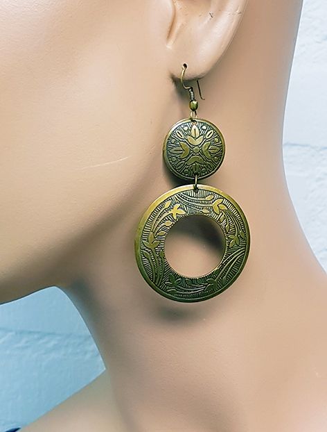 Oriental design earrings in old gold