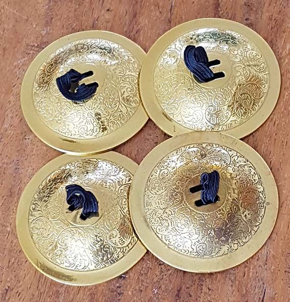 Large cymbals in gold color