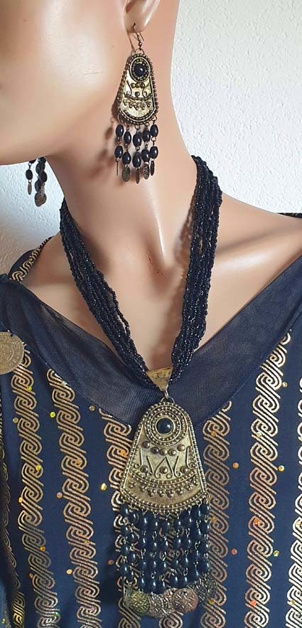 Necklace amulet and earrings