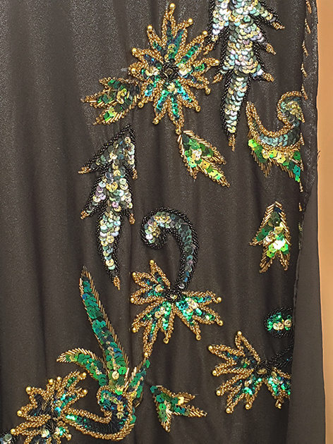 Belly dance costume in black with green  and gold sequins