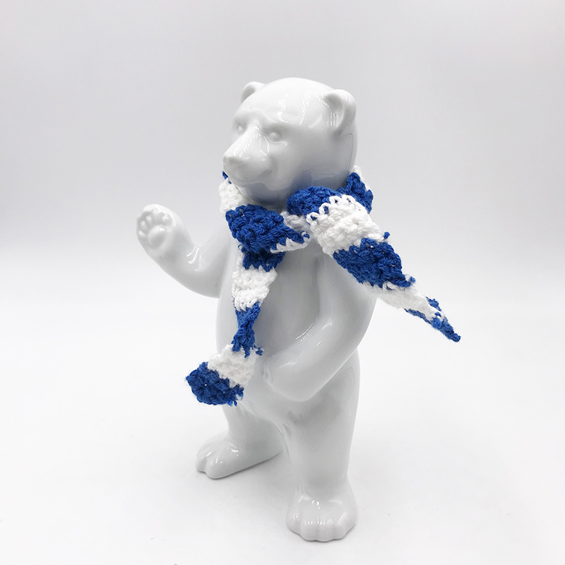 ART-DOMINO® BY SABINE WELZ Porcelain bear from Berlin - With blue and white scarf