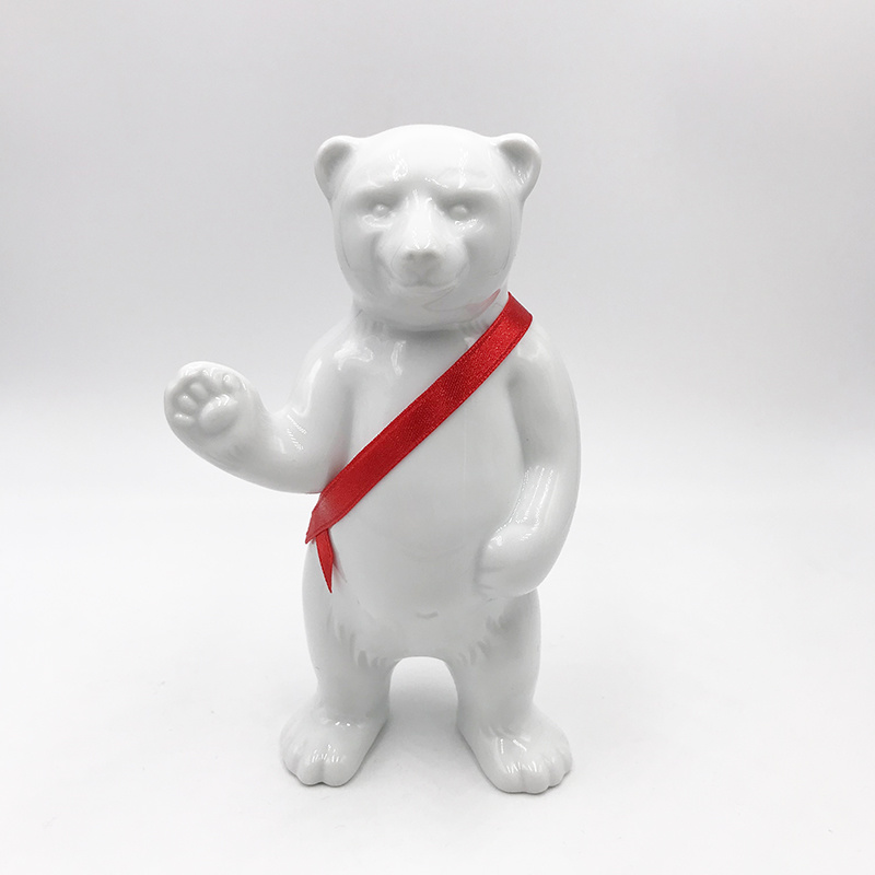 ART-DOMINO® BY SABINE WELZ Porcelain bear from Berlin - With red sash