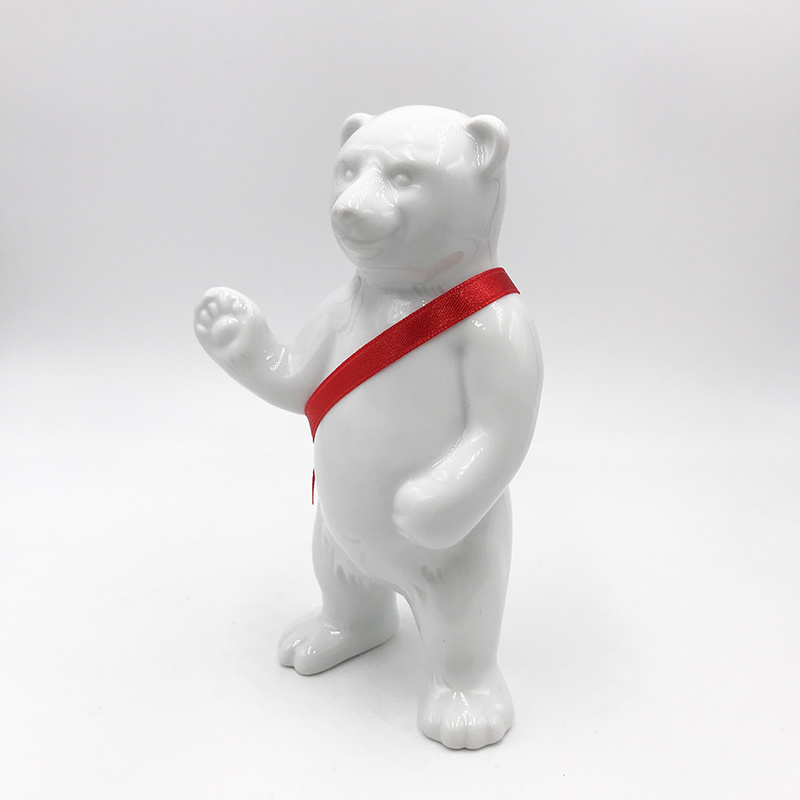 ART-DOMINO® BY SABINE WELZ Porcelain bear from Berlin - With red sash