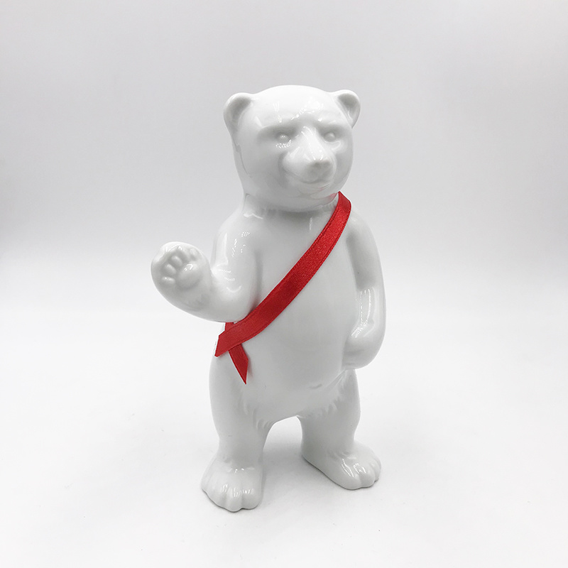 MAGNET-STORIES Ours en porcelaine de Berlin - Avec ceinture rouge