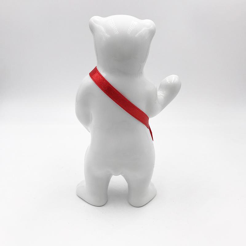 ART-DOMINO® BY SABINE WELZ Porcelain bear from Berlin - With red sash