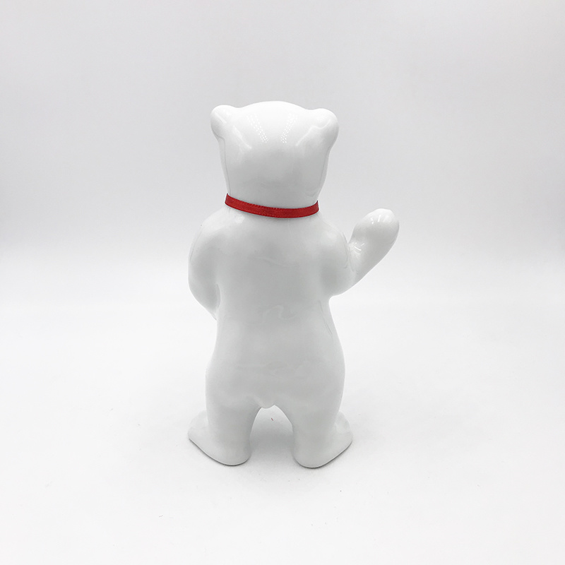 ART-DOMINO® BY SABINE WELZ Porcelain bear from Berlin - With red collar