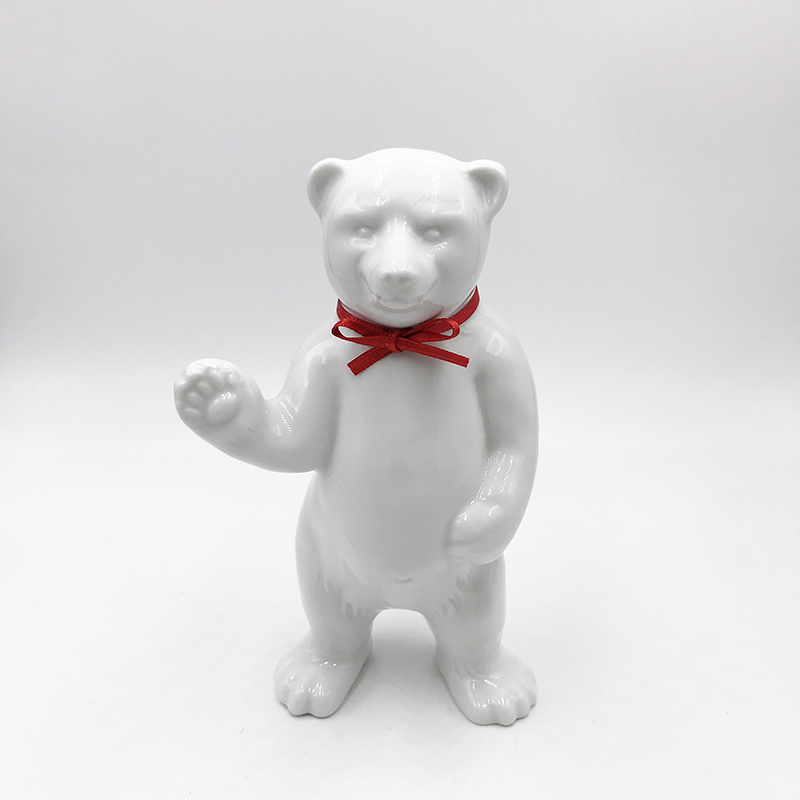 ART-DOMINO® BY SABINE WELZ Porcelain bear from Berlin - With red collar