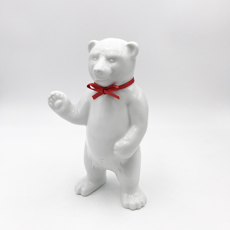 ART-DOMINO® BY SABINE WELZ Porcelain bear from Berlin - With red collar