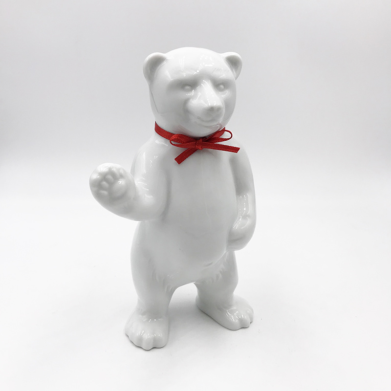 ART-DOMINO® BY SABINE WELZ Porcelain bear from Berlin - With red collar