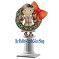 STEMPEL / STAMP: GUMMI / RUBBER Sello de goma: Muchacha con la corona de Navidad