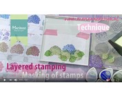 Se en demonstrasjon i denne videoen med Layered Stamp av Tiny Harts av Marianne Design!