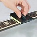 Gitarrensaiten Reinigungsgerät