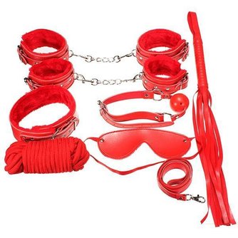 Luxus Red Bondage Kit, Bestehend Aus Unter Anderem Handschellen, Lederpeitsche, Und Ein Bisschen Mehr.