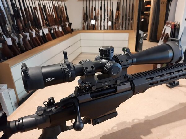 Tikka Tikka T3x Tac A1 6.5 Creedmoor with Vortex rifle scope and other accessories