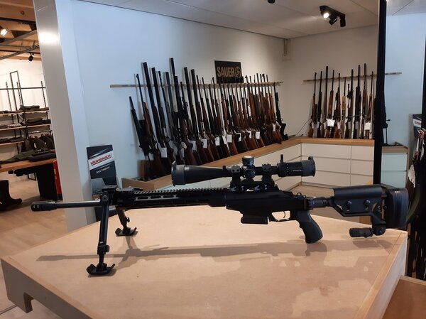 Tikka Tikka T3x Tac A1 6.5 Creedmoor with Vortex rifle scope and other accessories