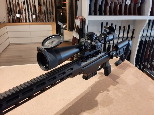 Tikka Tikka T3x Tac A1 6.5 Creedmoor with Vortex rifle scope and other accessories