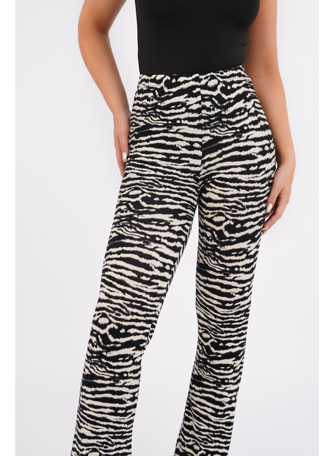 Flared pants met zebra print en stretch