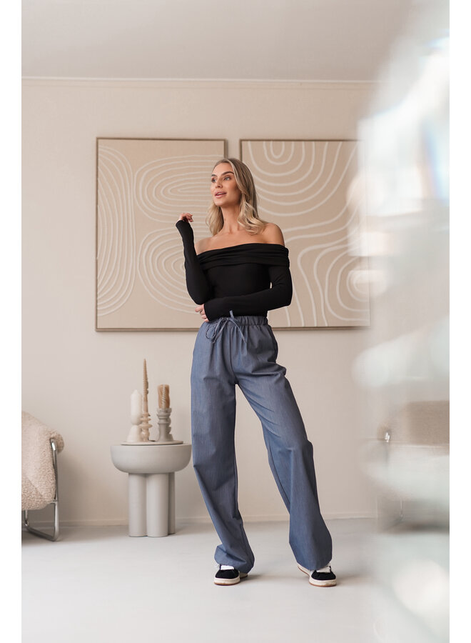 Body off shoulder zwart van travelstof