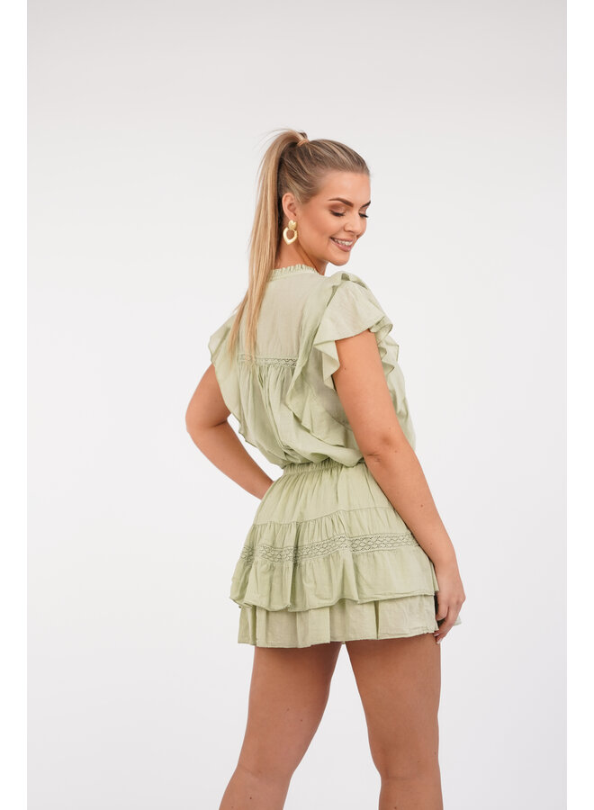 Top mint groen met ruffles en broderie details