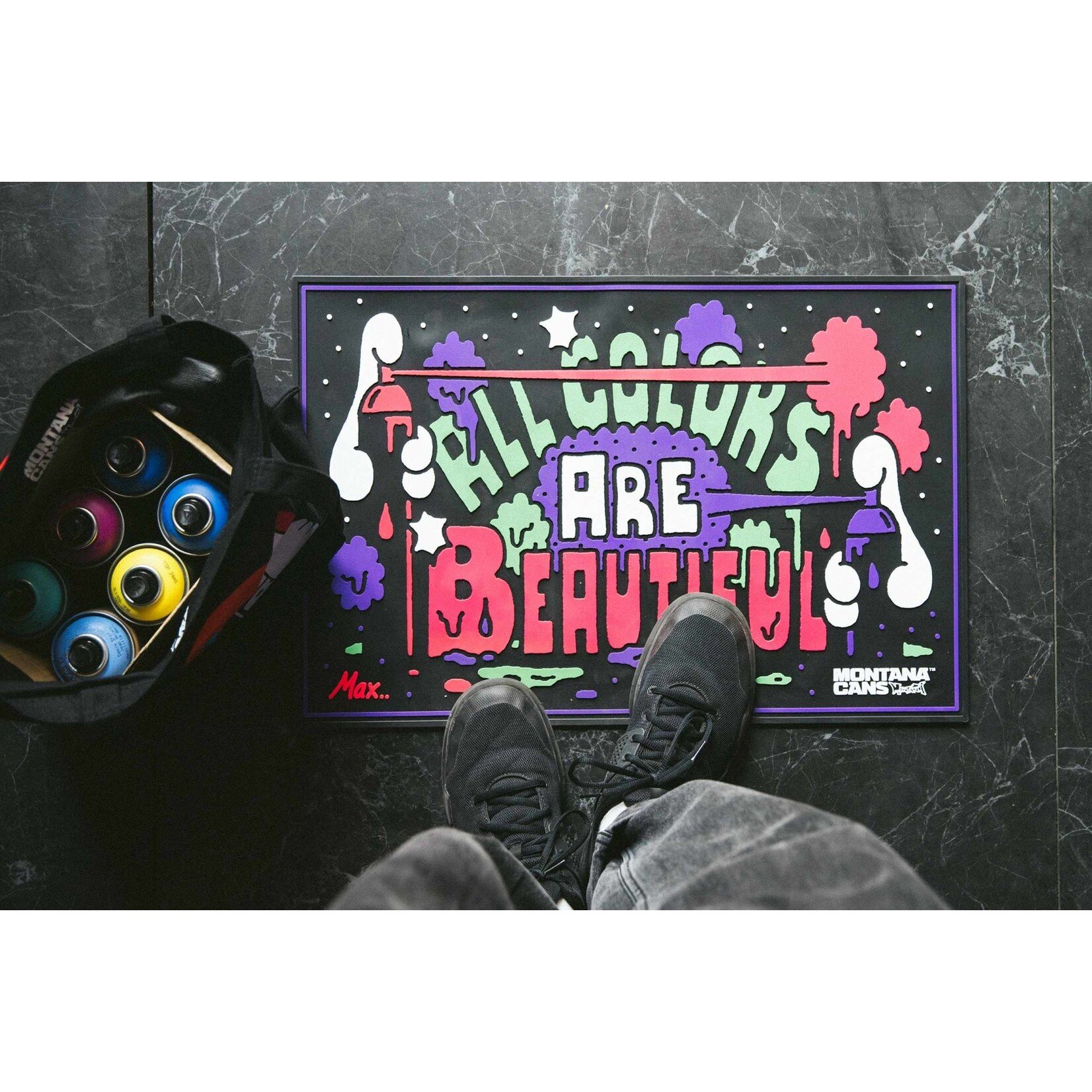 Montana Montana DOORMAT (Fußmatte) - "ALL COLORS ARE BEAUTIFUL" von Max Solca