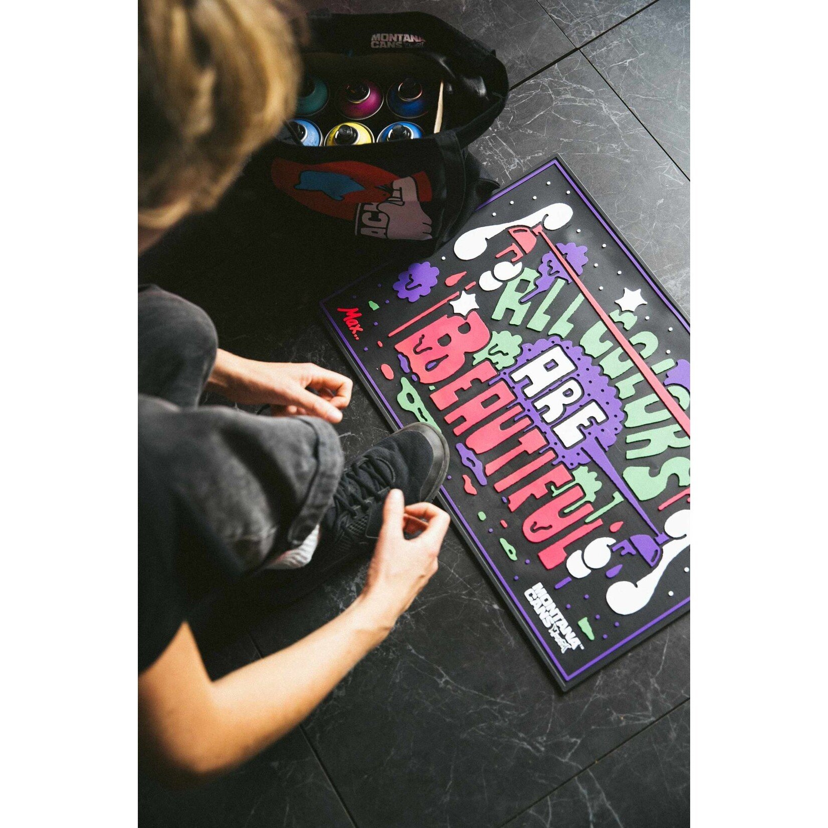 Montana Montana DOORMAT (Fußmatte) - "ALL COLORS ARE BEAUTIFUL" von Max Solca