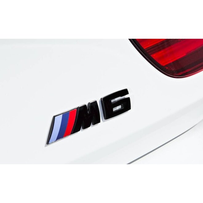 Schwarzes M6-Emblem