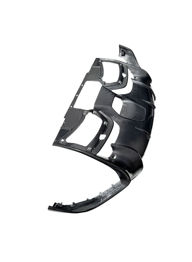 This is a Ferrari Purosangue Carbon OEM style diffuser rear bumper