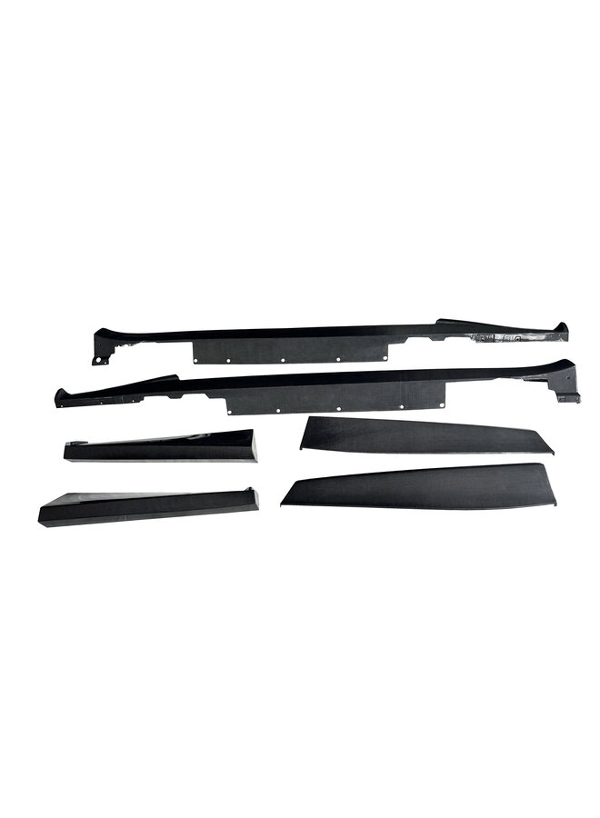 This concerns a set of Ferrari Purosangue Carbon OEM Style carbon side skirt extensions