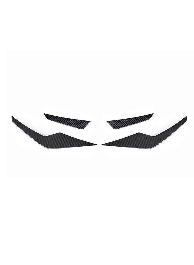 This is a set of BMW G90 G99 M5 SQ Carbon canards front bumper