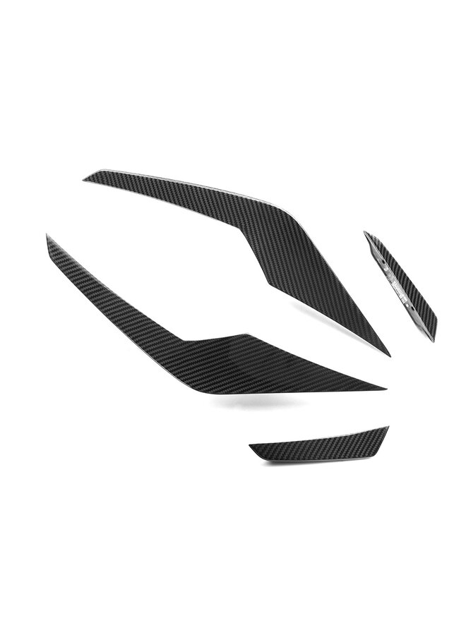 This is a set of BMW G90 G99 M5 SQ Carbon canards front bumper